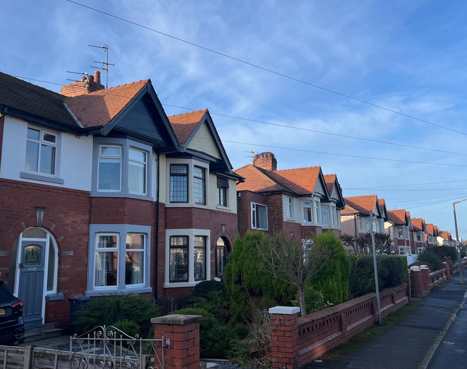 A row of semi-detached properties on a sunny day in the Fylde Coast area